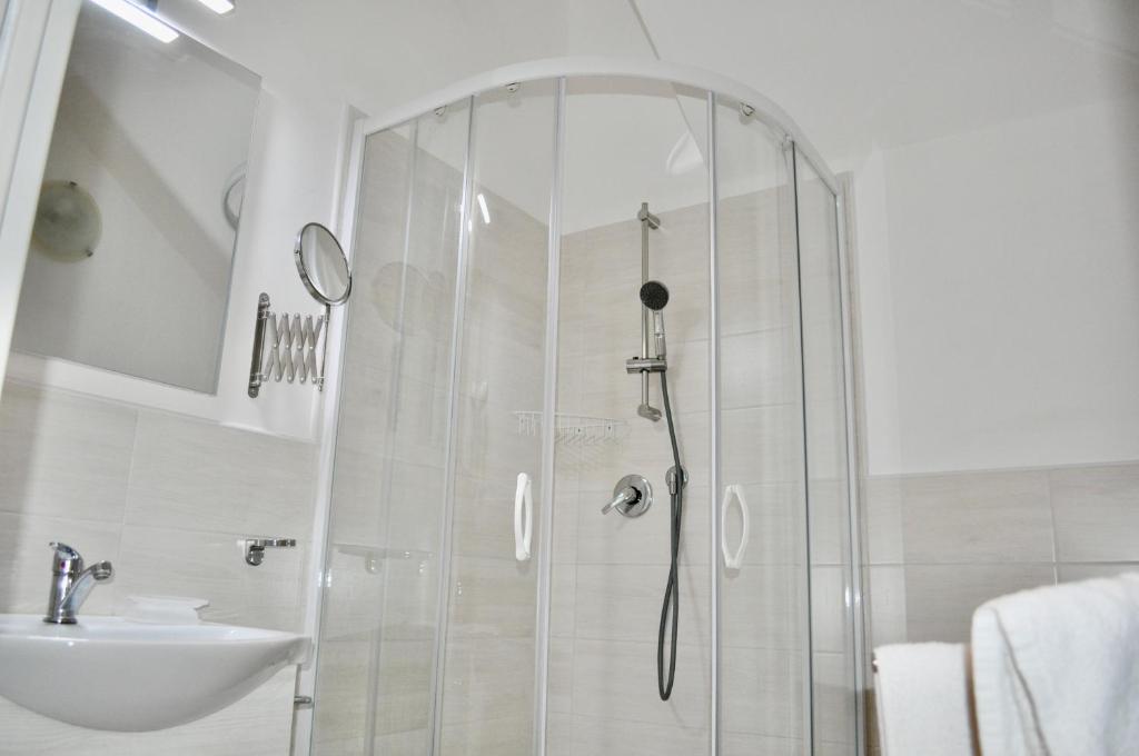 Koupelna v ubytování Hotel Corallo Garnì