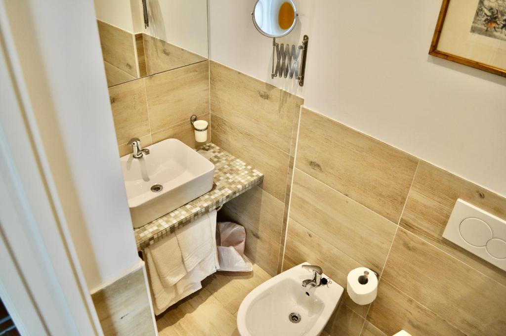 Koupelna v ubytování Hotel Corallo Garnì