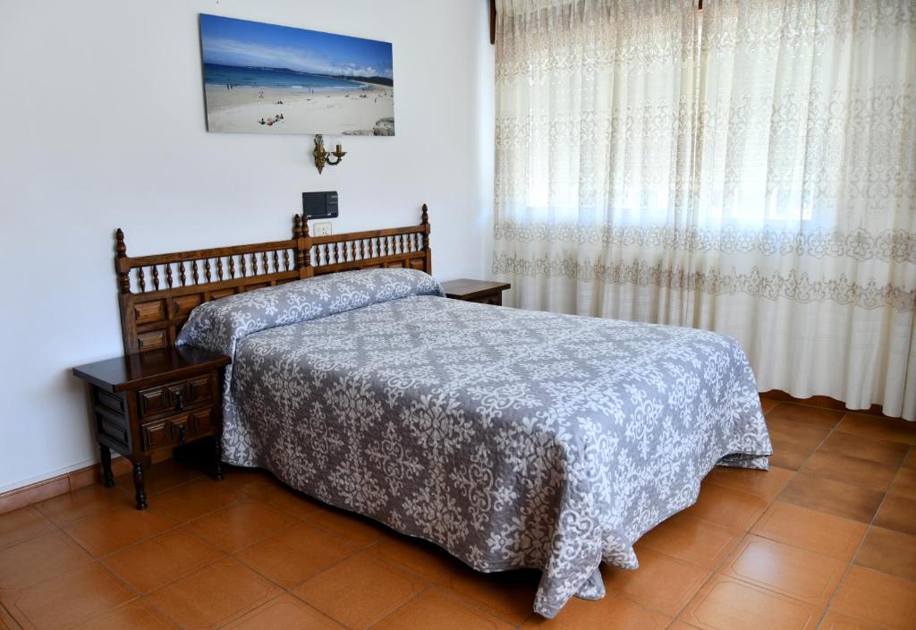 Posteľ alebo postele v izbe v ubytovaní Hotel Maruxa