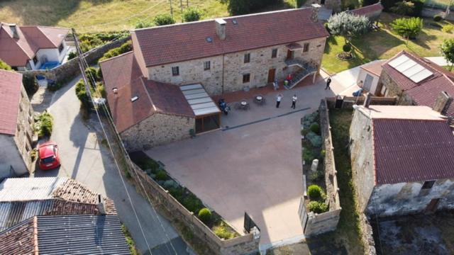 The surrounding neighborhood or a neighborhood close to the country house