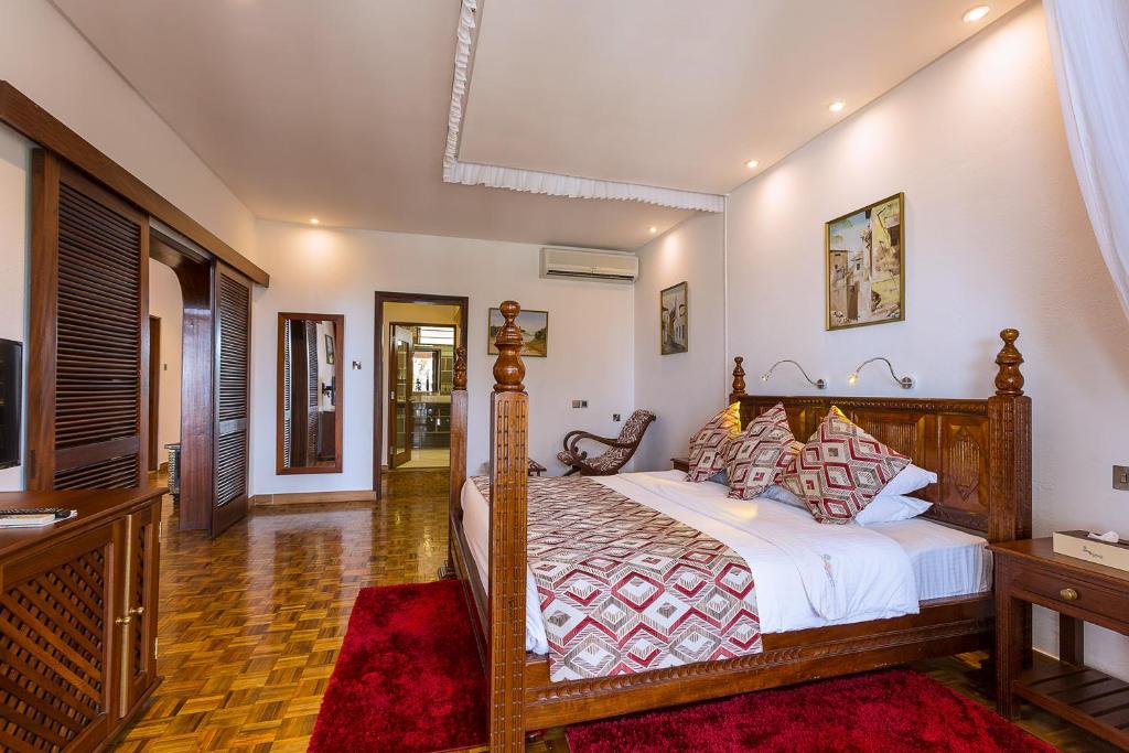 Postel nebo postele na pokoji v ubytování Travellers Beach Hotel & SPA