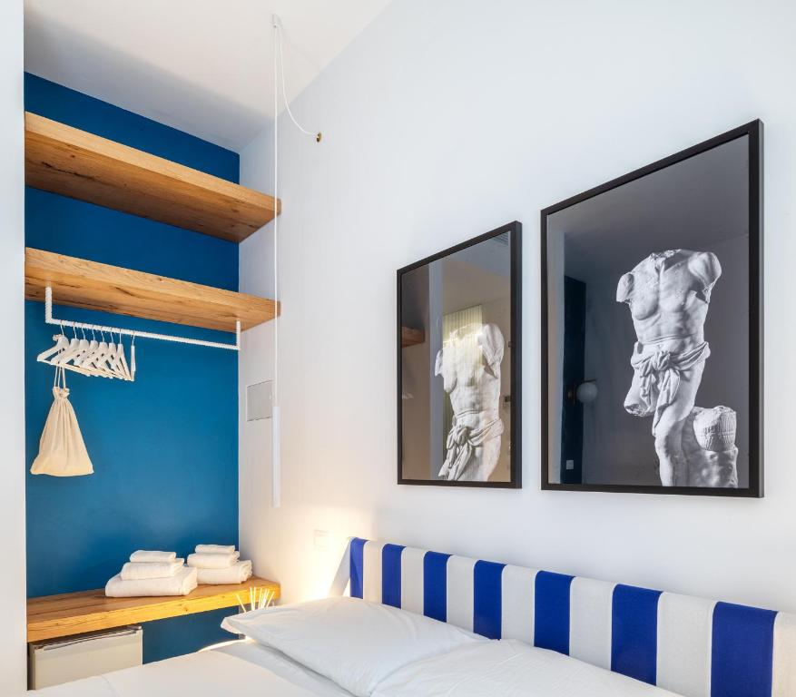 Postel nebo postele na pokoji v ubytování Near Ortigia