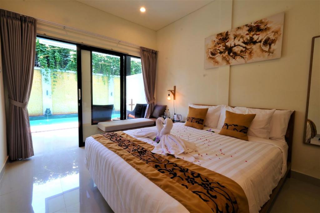 Hotel and Villa B52 Gili Air客房内的一张或多张床位