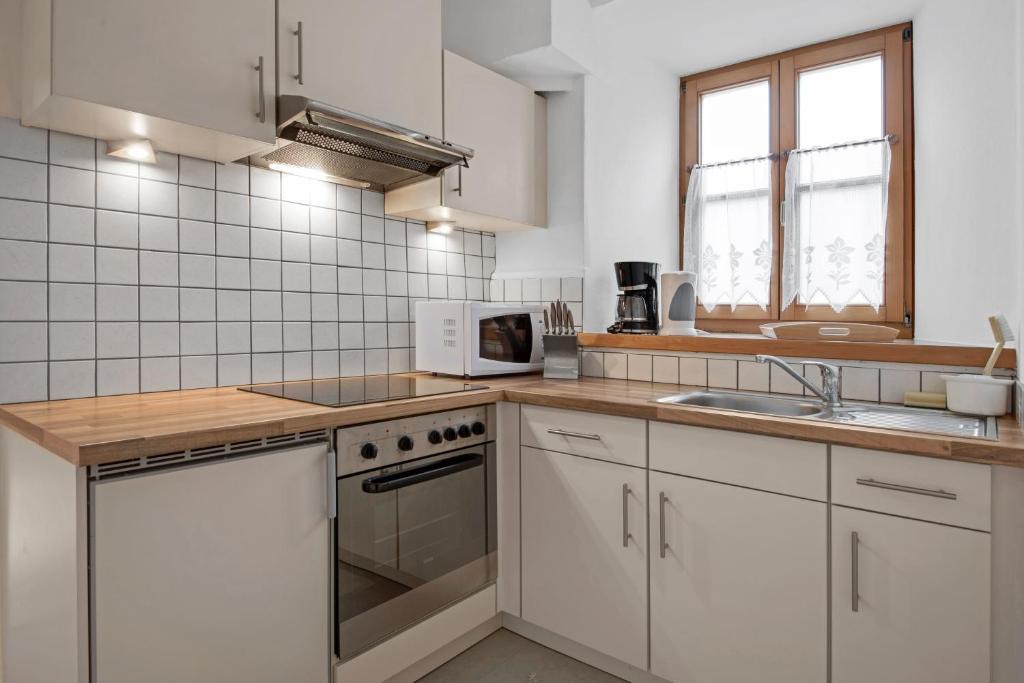 Kuchyň nebo kuchyňský kout v ubytování Rafaser - Apartment Albina