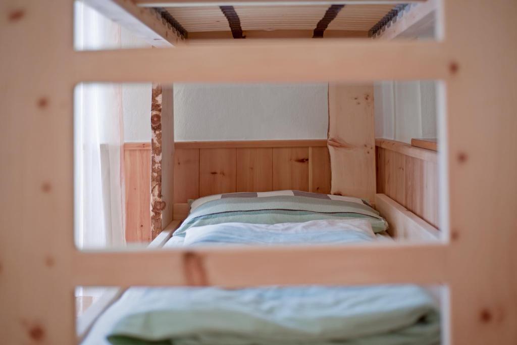 Postel nebo postele na pokoji v ubytování Rafaser - Apartment Albina