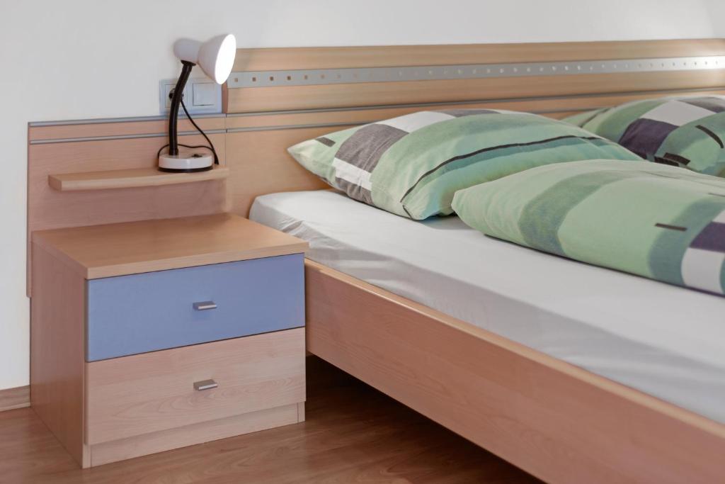 Postel nebo postele na pokoji v ubytování Rafaser - Apartment Albina