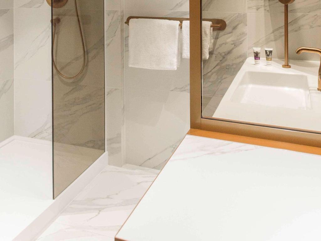 Cama ou camas em um quarto em Mercure Luxembourg Off Kirchberg