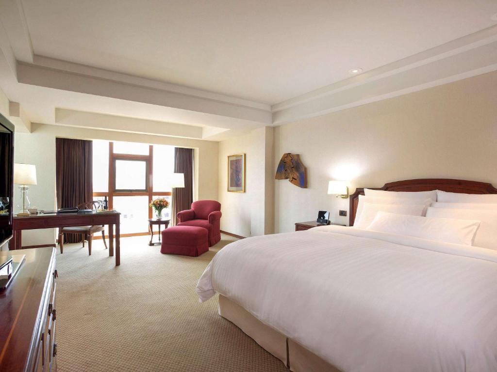 Letto o letti in una camera di Swissotel Lima