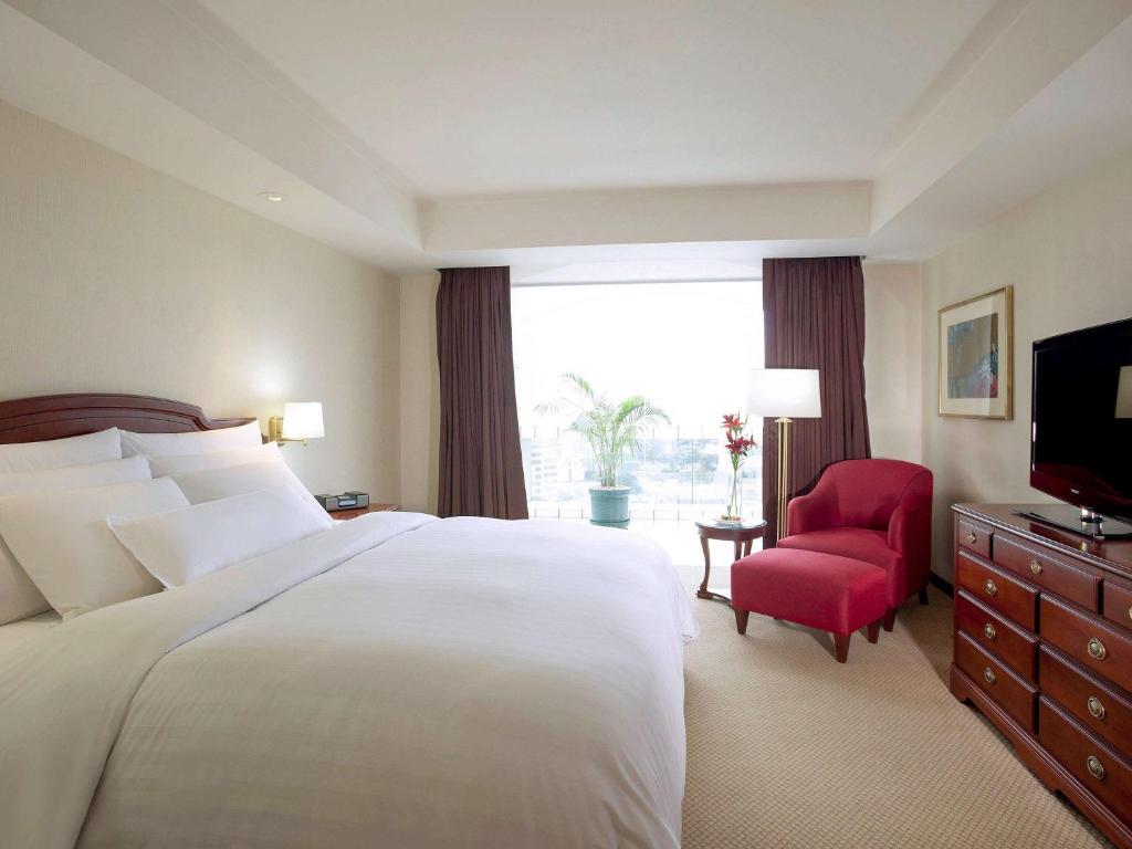 Letto o letti in una camera di Swissotel Lima