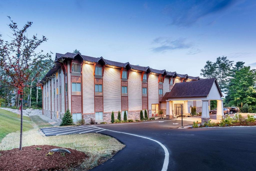 a large building with a road in front of it at The Chandler at White Mountains, Ascend Hotel Collection in Bethlehem