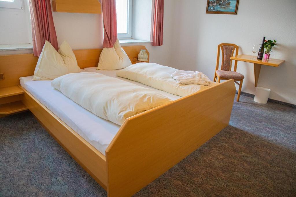 Postel nebo postele na pokoji v ubytování Landhotel Haagerhof