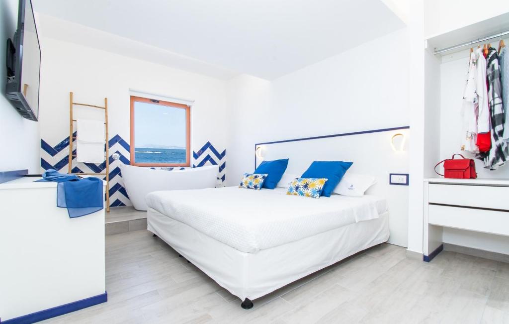 Postel nebo postele na pokoji v ubytování Sapphire Rooms