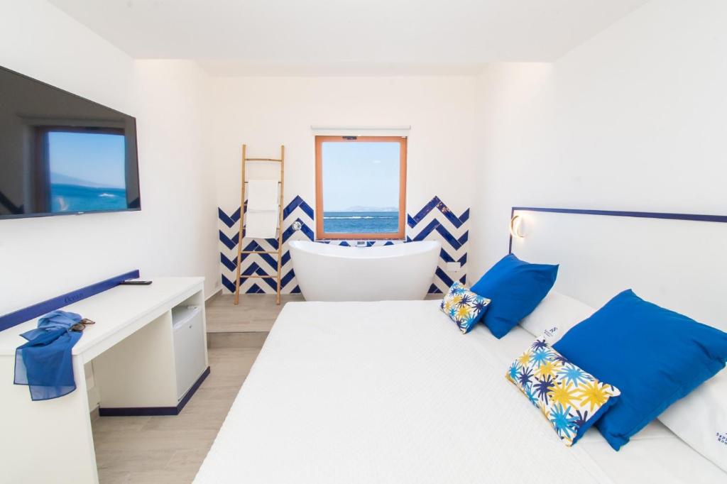 Postel nebo postele na pokoji v ubytování Sapphire Rooms