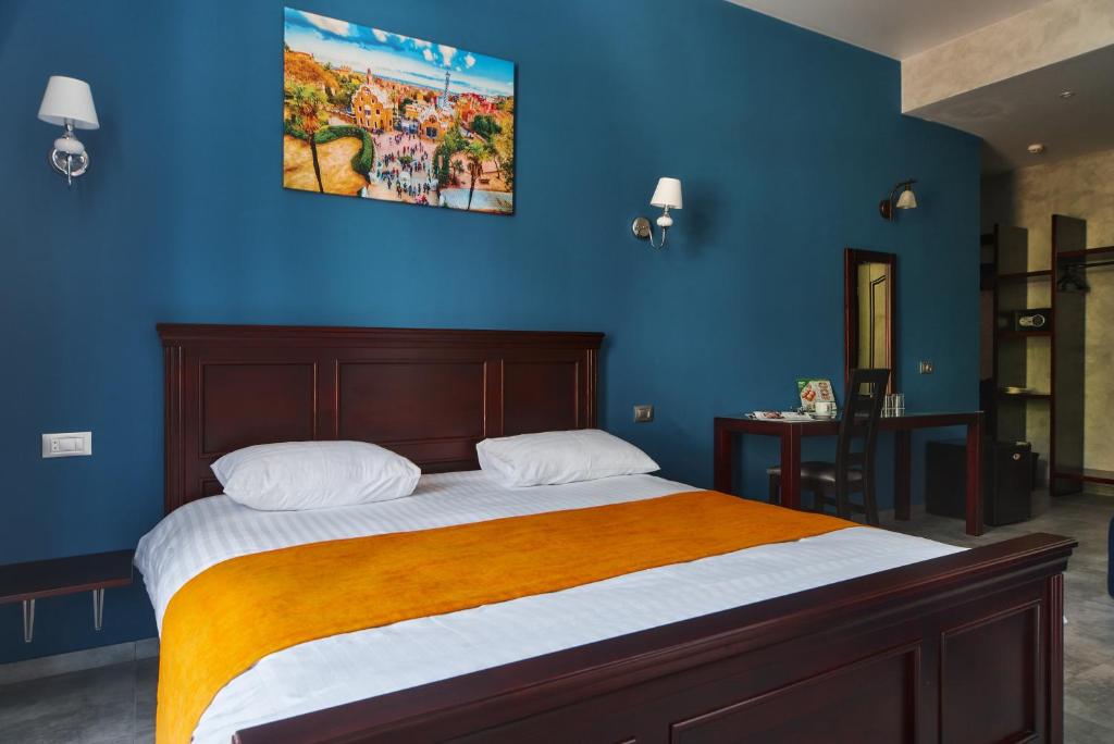 Postel nebo postele na pokoji v ubytování Gaudi stylish hotel