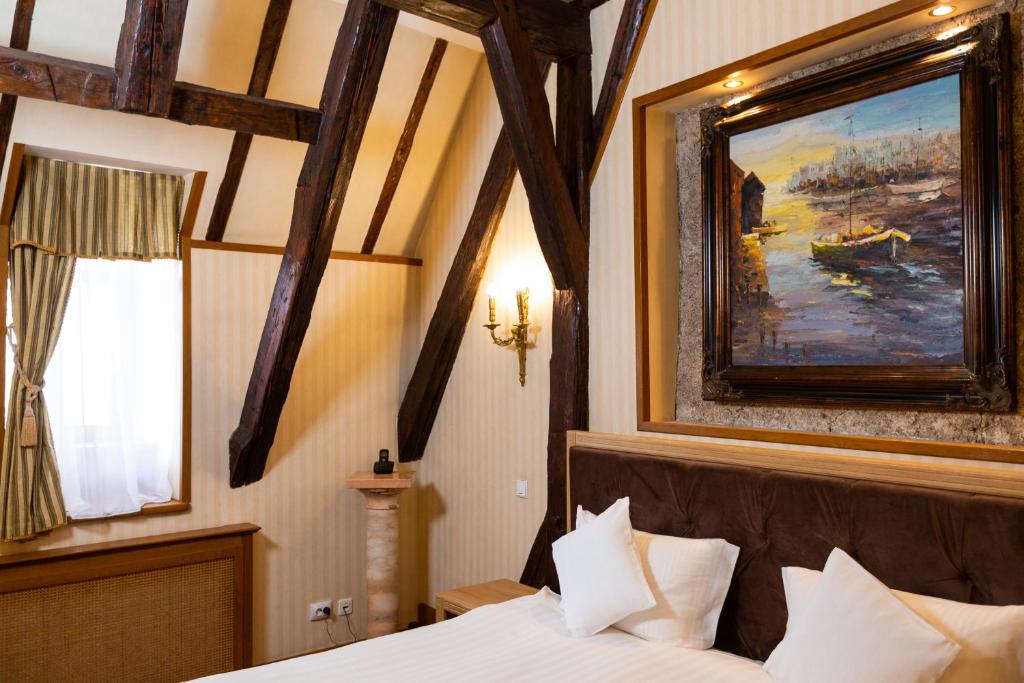 Postel nebo postele na pokoji v ubytování Hotel Am Ring