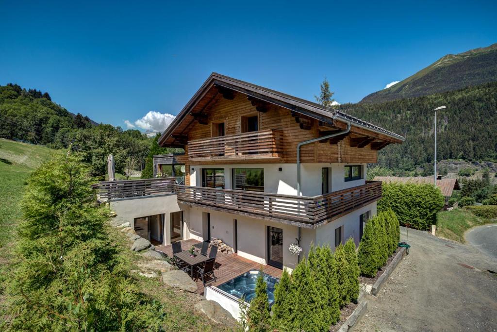 a house on a hill with a house at Chalet Rubicon in Les Houches