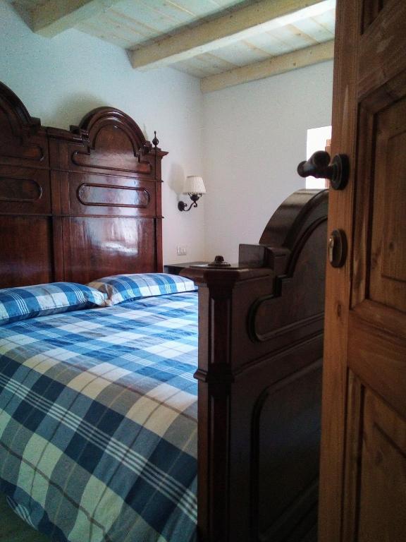 Postel nebo postele na pokoji v ubytování Da Andrea e Raffaella