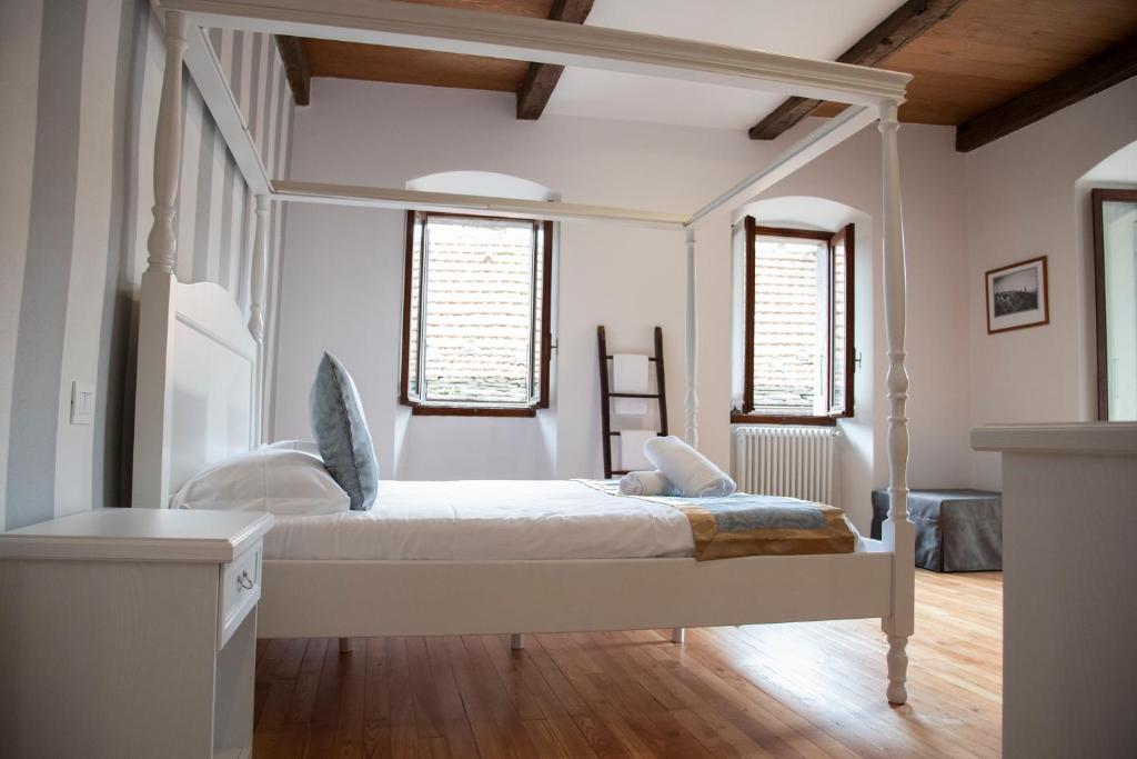 Letto o letti in una camera di Dimora Domese