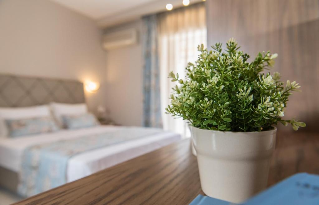 Postel nebo postele na pokoji v ubytování Hotel Olga