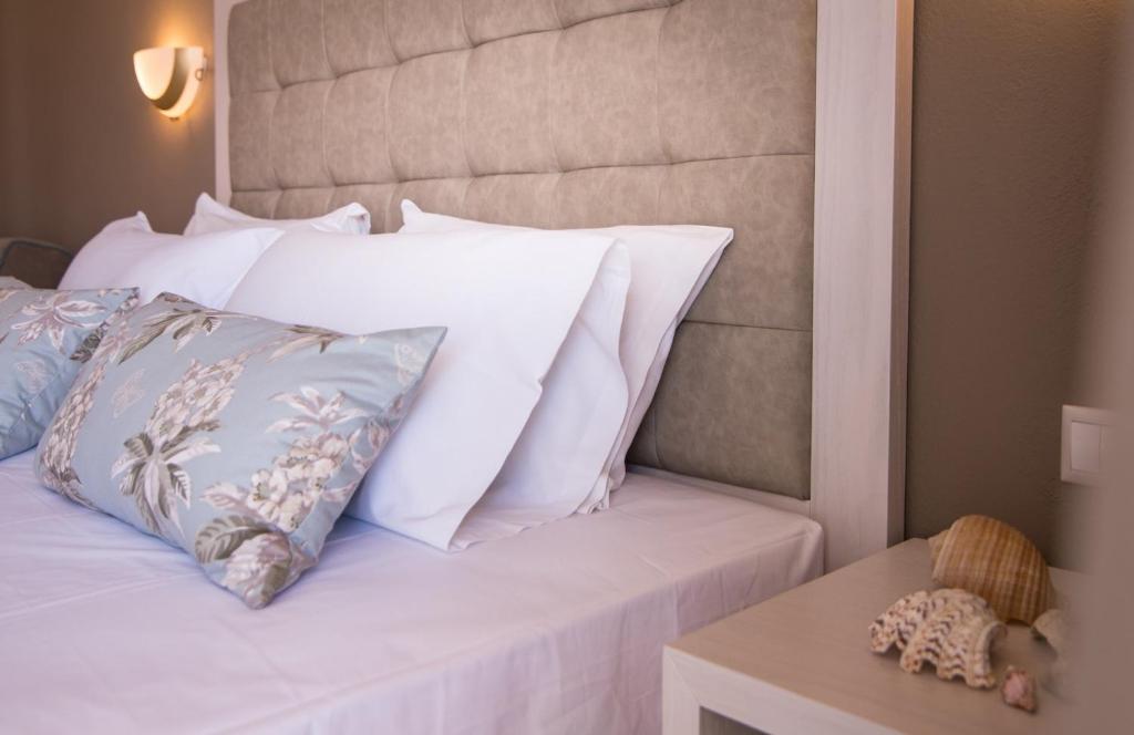 Postel nebo postele na pokoji v ubytování Hotel Olga