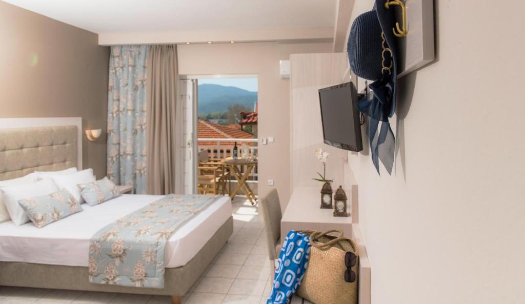 Postel nebo postele na pokoji v ubytování Hotel Olga