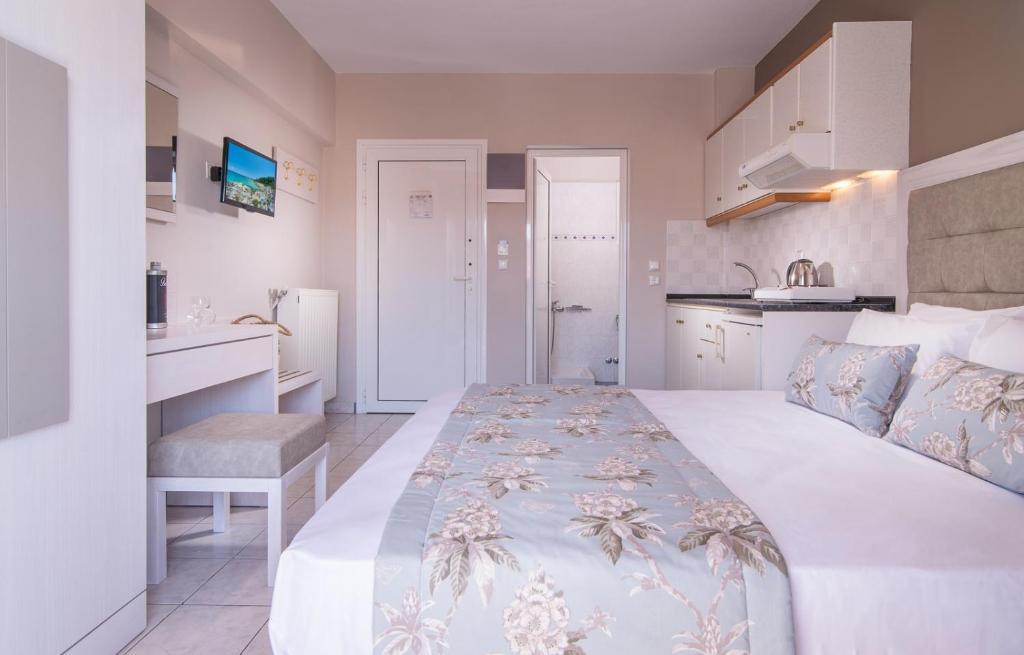 Postel nebo postele na pokoji v ubytování Hotel Olga