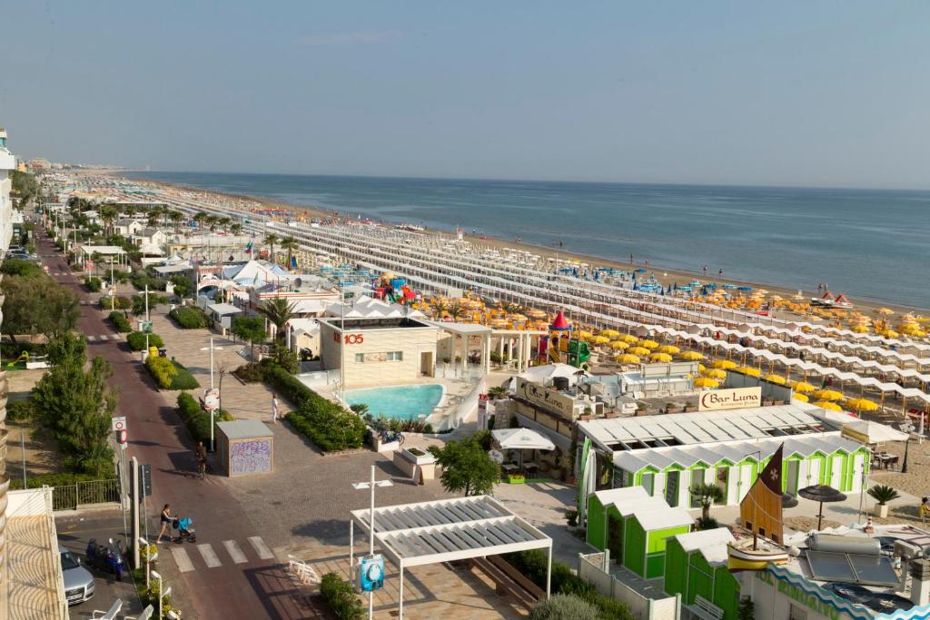 an aerial view of a beach with a cruise ship at Hotel Astra in Riccione