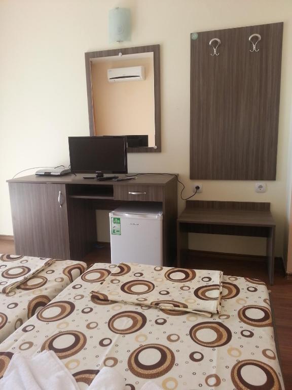 Postel nebo postele na pokoji v ubytování Hotel Ray