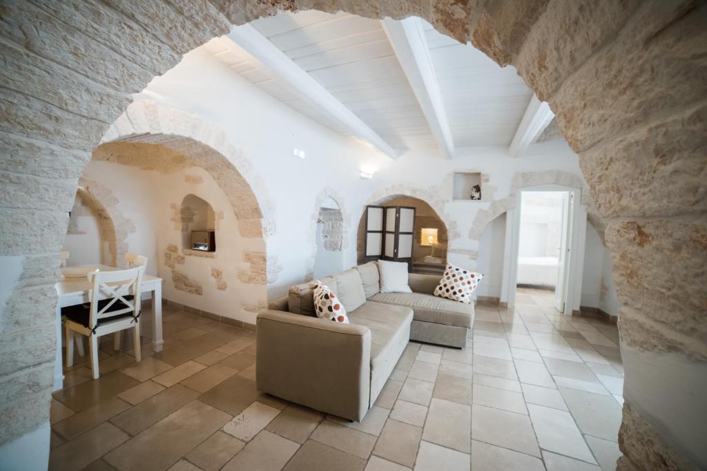 Posezení v ubytování Charming Trulli