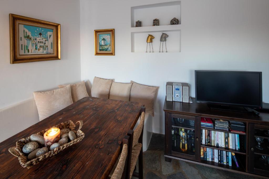 Televízia a/alebo spoločenská miestnosť v ubytovaní Drafies House