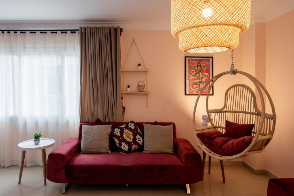 Posezení v ubytování The 2BDR Compelling Condo 5 min to CAI Airport
