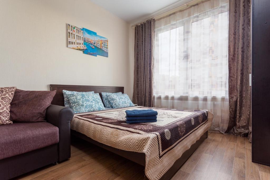Un pat sau paturi într-o cameră la #Go2SPB - GLORY View Apartement SOFIA