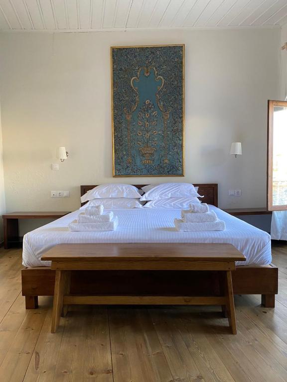 Postel nebo postele na pokoji v ubytování Captain Vasilis Hotel