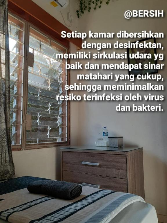 Voodi või voodid majutusasutuse GIO Guesthouse Bogor toas