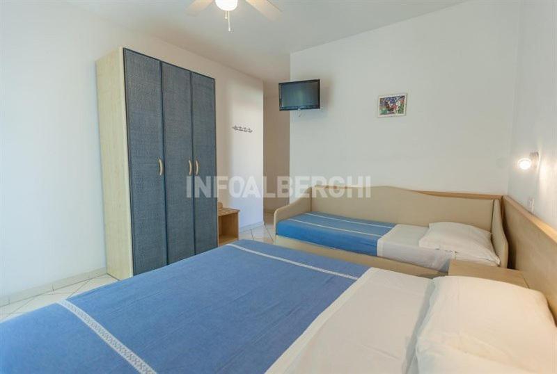 Postel nebo postele na pokoji v ubytování Hotel San Domingo