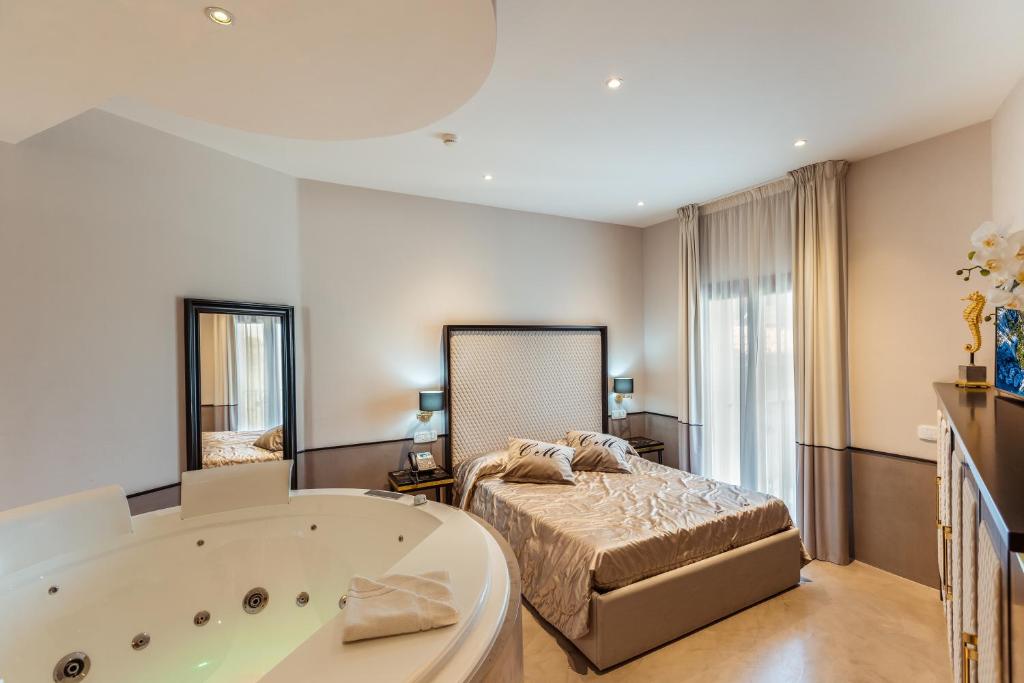 La Locanda Del Conte Mameli - Boutique Hotel & Suite SPA - Suite Familiar Con Bañera De Hidromasaje