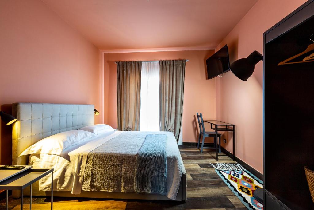 Postel nebo postele na pokoji v ubytování BnB Sant'Alfonso