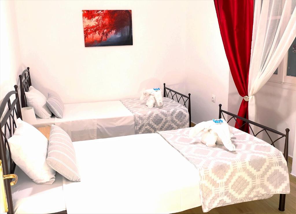 Łóżko lub łóżka w pokoju w obiekcie Cofineta Apartment