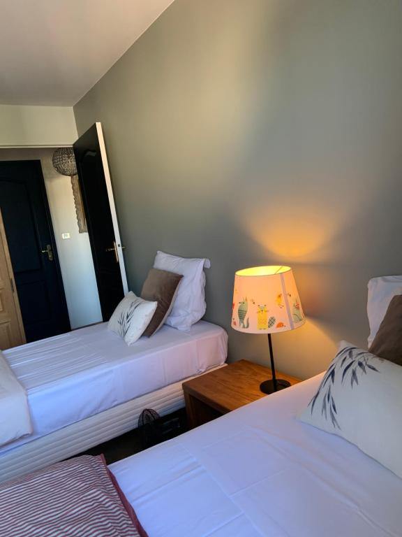 Ένα ή περισσότερα κρεβάτια σε δωμάτιο στο Luxury Appartement Disneyland