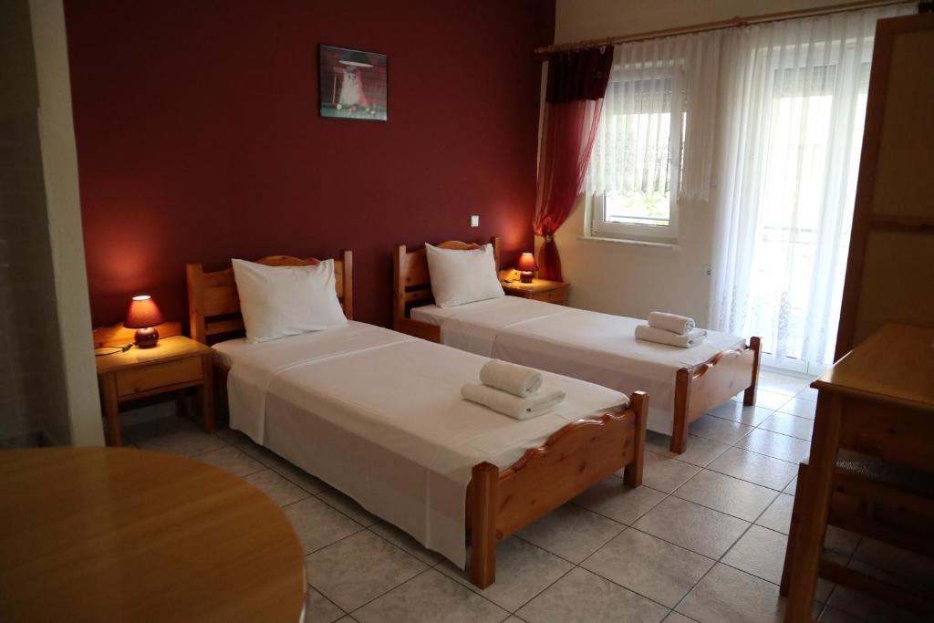Posteľ alebo postele v izbe v ubytovaní Delphin Rooms Sivota