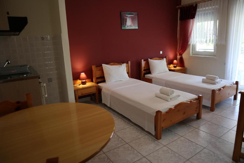 Posteľ alebo postele v izbe v ubytovaní Delphin Rooms Sivota