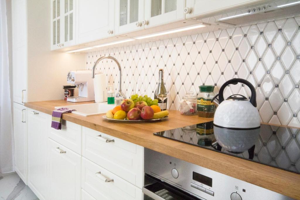 Kuchyň nebo kuchyňský kout v ubytování Apartament Prowansalski