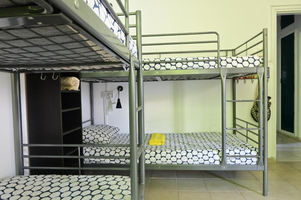 Postel nebo postele na pokoji v ubytování Lemongrass Hostel