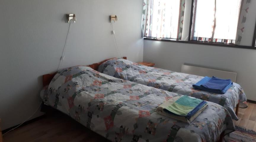 Postel nebo postele na pokoji v ubytování Sassi Talu Horsefarm