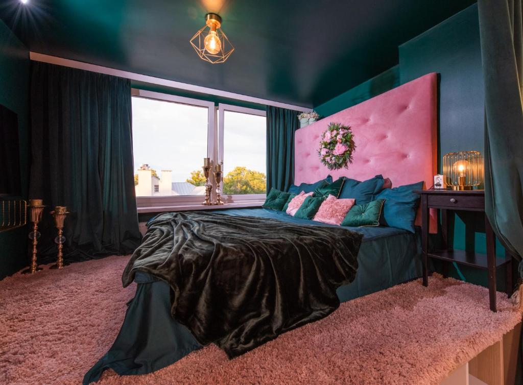 Postel nebo postele na pokoji v ubytování La Rossa Sopot Apartaments