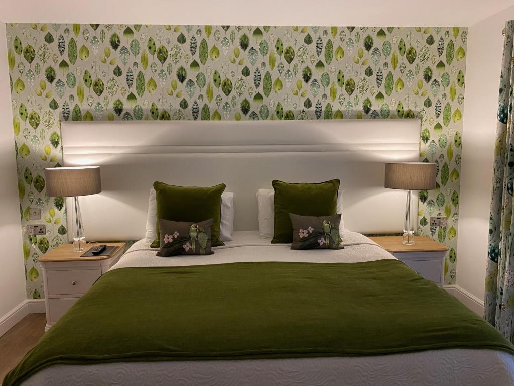 En eller flere senge i et værelse på Toppesfield House B&B
