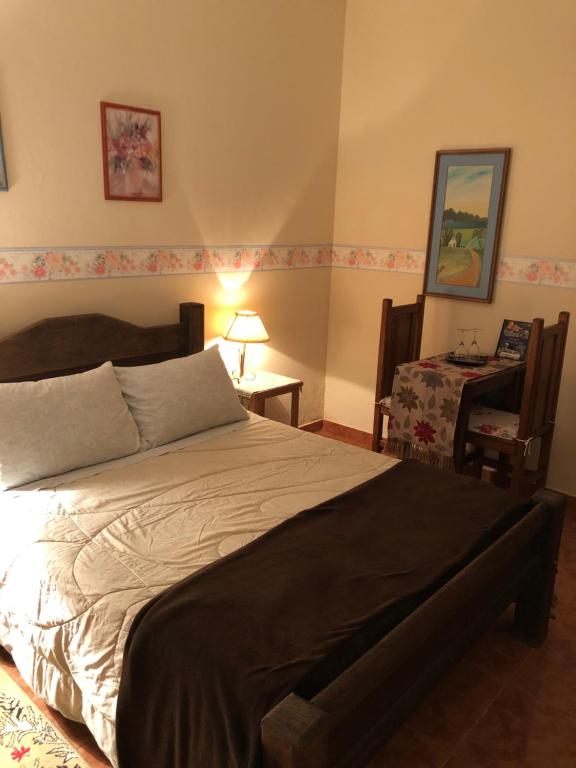 Uma cama ou camas num quarto em Pousada Vale dos Sonhos