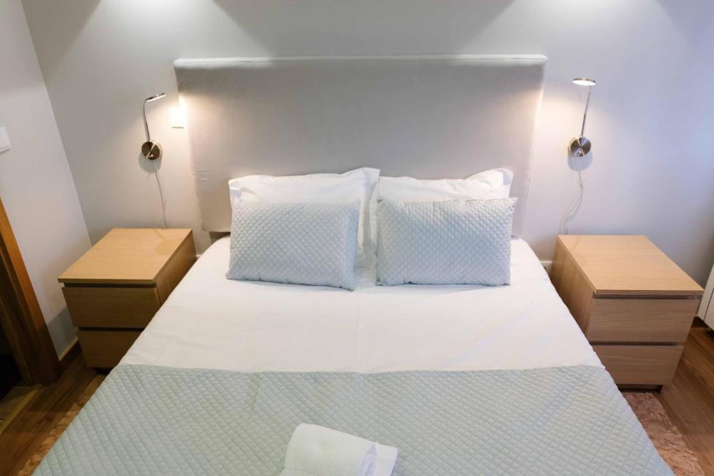 Postel nebo postele na pokoji v ubytování MAGNIFIKSTYLE - Alojamento Local 3