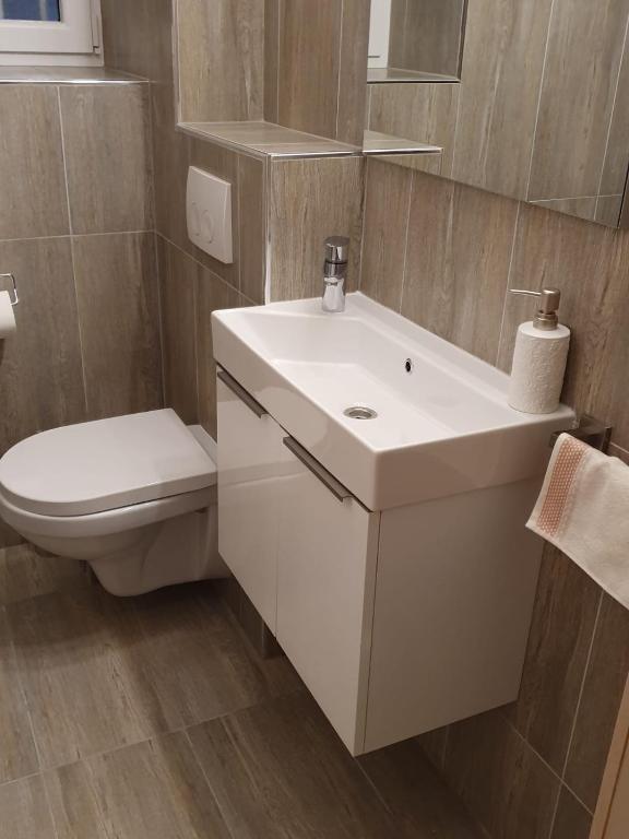 Koupelna v ubytování Rooms Marija