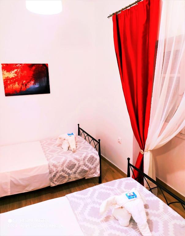 Łóżko lub łóżka w pokoju w obiekcie Cofineta Apartment